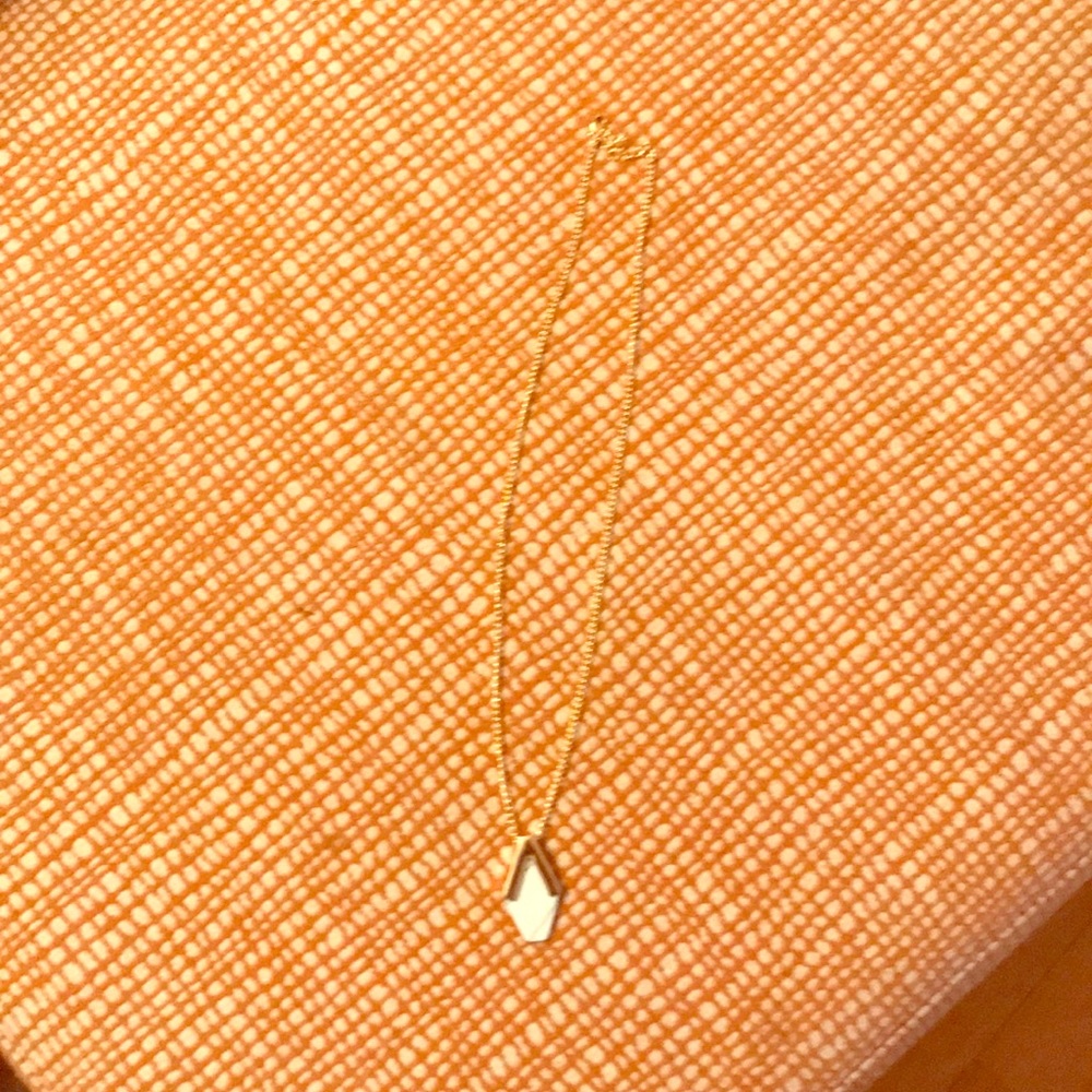 White and gold necklace